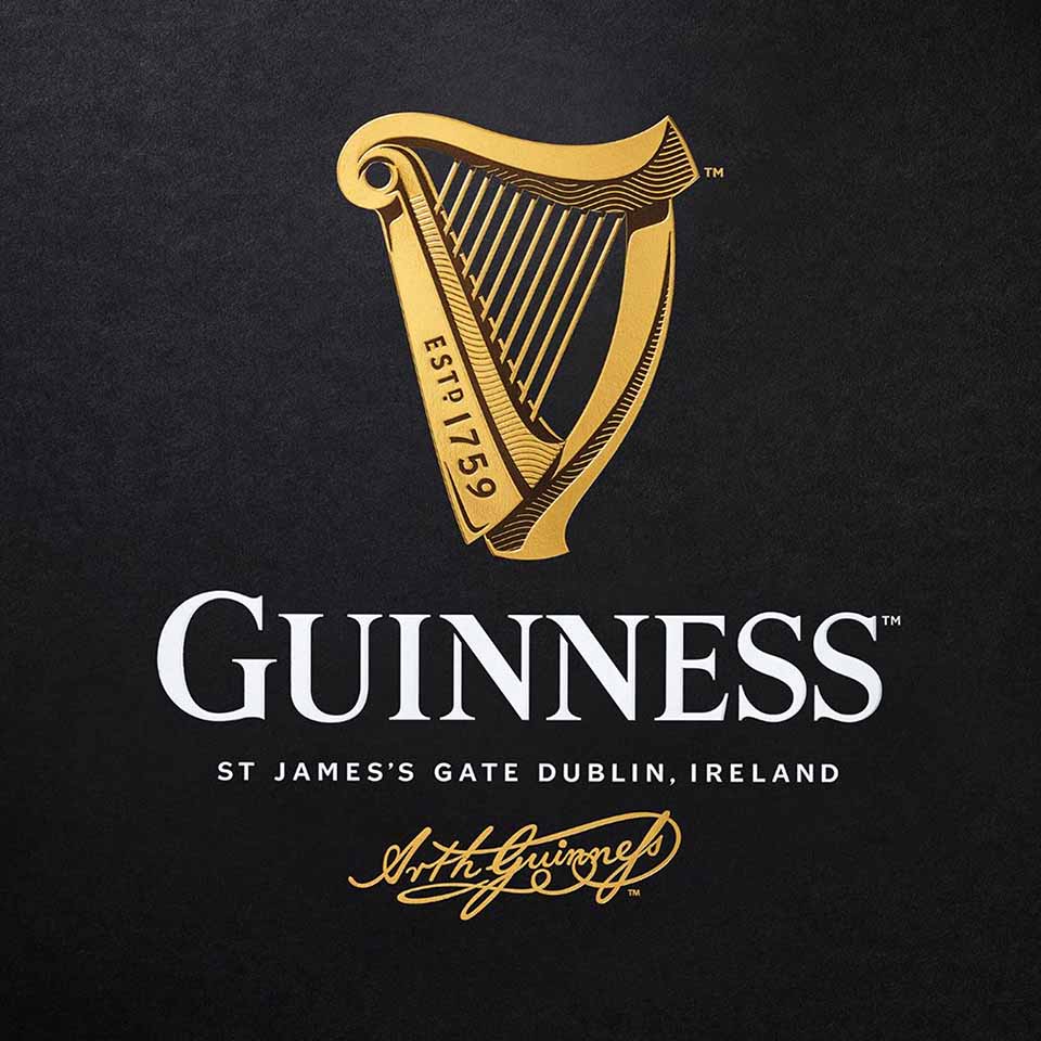Gold harp logo with "ESTD 1759," white "GUINNESS" text, and St. James’s Gate Dublin, Ireland below.